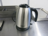 Quantity of Kitchen Accessories to Include: 1 x Russell Hobbs Kettle, 1 x Vitafit Kitchen Scales, 5 x Plastic Mixing Bowls, 1 x Metal Mixing Bowl, 3 x Plastic Measuring Jugs, 15 x Assorted Sized Metal Trays, 1 x Large Rolling Pin (missing nut) & 2 x Wine - 6