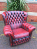 Oxblood Red Chesterfield Style Leather Arm Chair with Button Back & Stud Detail.