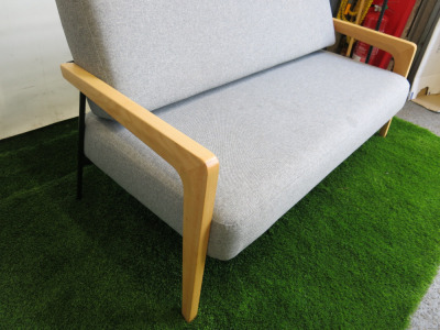 Calibre Hektor Executive Two Seater Sofa with Back Cushion, Beech Wood Frame, Black Metal Legs & Finished in Grey Vitreous. Size H76 x W153 x D69cm.