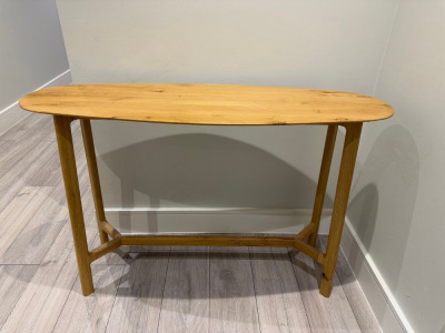 Light Wood Oval Top Side Table. Size H80 x W120 x D40cm.