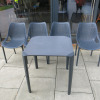Set of Outside Stackable Furniture to Include: 4 x Ezpeleta One Tables, Size H70 x W70 x D70cm, 14 x Plastic Chairs in Grey & 10 x Grey Cushions. - 5
