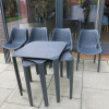Set of Outside Stackable Furniture to Include: 4 x Ezpeleta One Tables, Size H70 x W70 x D70cm, 14 x Plastic Chairs in Grey & 10 x Grey Cushions.