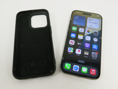 Apple iPhone 15 Pro, 256GB in Natural Titanium, Model MTV53ZD/A, S/N HJNWPFX1QL. Comes with Black Silicon Case NOTE: screen cracked.