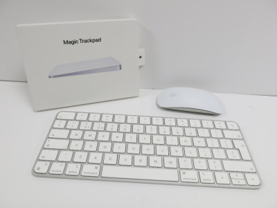 Apple Wireless Keyboard, Trackpad & Mouse to Include: A2450 Keyboard, A1657 Mouse, A1535 Trackpad in Box. NOTE: crack to trackpad.