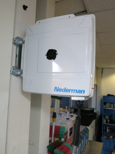 Nederman Retractable Hose Reel 883, YOM 2019. Requires Removal From Wall.