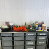 Crate Containing an Assortment of Drip Trays, Oil Cans, Degreaser, Grease, Funnels & Adhesive (As Viewed).