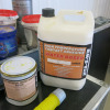 Crate Containing an Assortment of Drip Trays, Oil Cans, Degreaser, Grease, Funnels & Adhesive (As Viewed). - 9