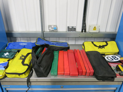 Large Quantity of Assorted Roadside & European Country Emergency Breakdown Kits to Include: 4 x AA Kits in Yellow Bags, 2 x Ring Kits in. Blue Bags & 2 x Other Black Bag Kits with Additional 9 x Triangles, Headlamp Beam Converters, UK/GB Stickers (As View