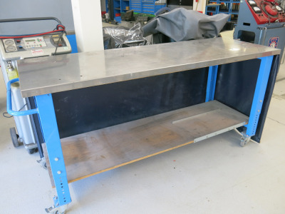 Mobile Height Adjustable Metal Framed Wood Top Workshop Table in Blue with Stainless Steel Top, Shelf Under & UPVC Curtain. Size W200 x D70cm.