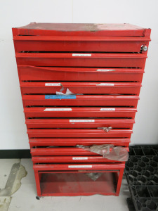 12 Draw Metal Workshop Cupboard in Red. Comes with Contents of UNF Nuts, Bolts, Head Studs, Washers Etc. Size H103 x W53 x D38cm.