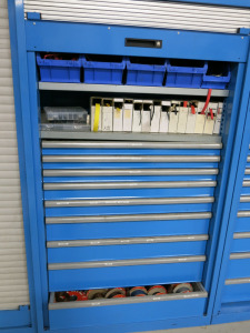 Lista 4 Shelf Roller Door Cupboard in Blue with 9 Drawer, 2 Shelf to include the contents of Electrical Components as Pictured and Viewed. Size H195 x W100 x D58cm.