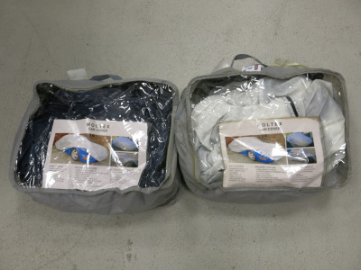 2 x Moltex Car Covers in White & Blue in Carry Bags.