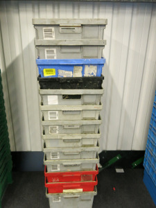 13 x Grey & Red Stacking Crates.