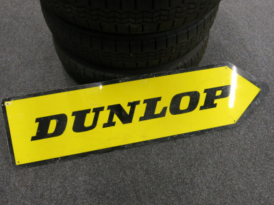 Dunlop Perspex Arrow Direction Sign. Size H25 x W99cm.