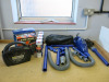 4 x Electrical Items to Include: 2 x 12v Chargers, 1 x Tyre Inflator & 1 x Mini Vacuum with Attachments & 4 x Cans of Clear Road Marking Primer. (Tower Building).