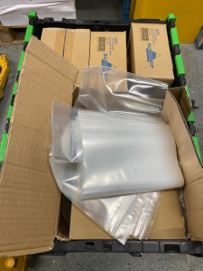 2 x Crates Containing a Large Quantity of Boxes of Suregrip Sealable Clear Bags, Assorted Sizes. (Note: Crates Not Included).