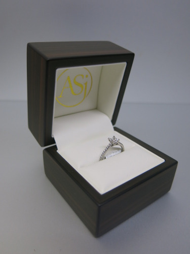 18ct White Gold, Diamond Ring with SS Princes Cut Diamond Centre (0.54ct) with Diamond Chip Shoulders in Box. Ring Size J-K. RRP &pound;4775.