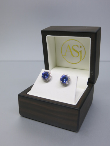 Pair of 18ct White Gold Earrings with Round Precious Purple Stone Stud & Diamond Cluster Surround in Box. RRP Unknown. NOTE: missing clasps.