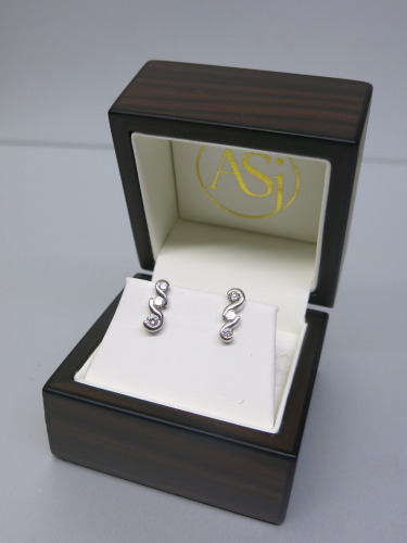 Pair of 18ct White Gold Earrings with 3 x Diamond Studs in Box. RRP &pound;995. NOTE: 1 x gold coloured & 1 x silver coloured back.