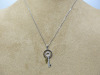 18ct White Gold Necklace with Diamond (0.14ct) Set Key Pendant. RRP &pound;710.