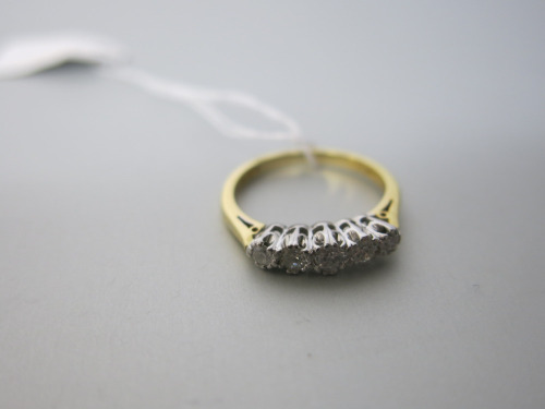 18ct Gold Ring with 5 Diamonds in White Gold Claw Mount. Size K-L.