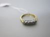 18ct Gold Ring with 5 Diamonds in White Gold Claw Mount. Size K-L.