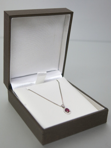 9ct White Gold 16" Chain & 18ct White Gold Pendant with Ruby Centre & Diamond Surround. RRP &pound;395.