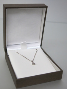 18ct White Gold 16" Chain with Triangular Diamond Pendant. RRP &pound;629.