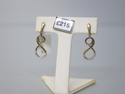 Pair of 9ct Gold, Infinity Earrings with Diamond Chips. RRP &pound;215.