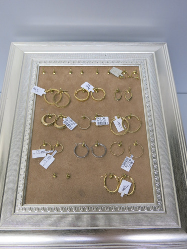11 x Pairs of 9ct Gold Hoop Earrings on Display Frame (As Viewed).