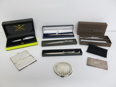 8 x Silver Items to Include: 3 x Letter Openers in Boxes, 2 x Cross Pens, 1 x Silver Compact & 2 x Silver Business Card Holders (As Viewed).