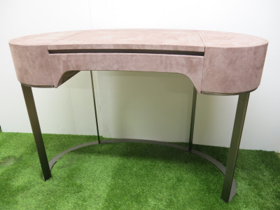 Yves Baxter made in Italy Designer Roberto Lazzaroni Kidney Velvet Wrapped Dressing Table with Lift Up Centre Mirror, Compartments & Heavy Metal Base. Finished in Dusky Pink Velvet Size H76 x W110 x D55cm. Designer Roberto Lazzeroni's Yves desk for the Ba