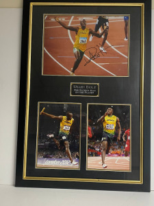 Usain Bolt Signed Photograph in Framed & Glazed Presentation Frame, with Certificate of Authenticity on Back. Size 60 x 90cm.