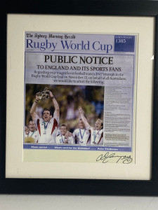 Newspaper Cut Out of England Rugby Celebrates Webb Ellis Cup, Signed (Unknown. Framed & Glazed. Size 50 x 45cm.