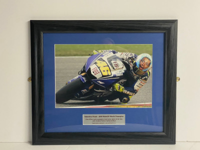 Framed & Glazed Image of Valentino Rossi 2008 Moto GP World Champion. Size 43 x 38cm.