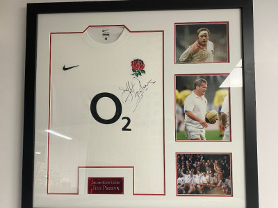 Signed England Rugby Shirt of Rugby Legend Jeff Probyn with 3 Images in a Framed & Glazed Presentation with Certificate of Authenticity. Size 85 x 81cm.