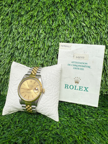 Rolex Datejust 18ct Gold & Stainless Wrist Watch, 36mm Gold Dial, Model 16233, Year 1991. Comes with Original Certificate. NOTE: no original box available with this watch and we have had verified as original, however buyers are always encouraged to sat