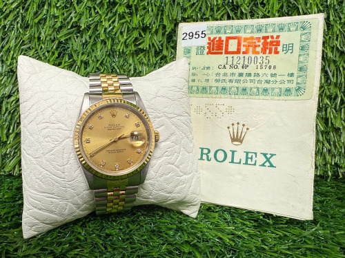 Rolex Datejust 18ct Gold & Stainless Wrist Watch, 36mm Gold with Diamond Aftermarket Dial, Model 16233, Year 1991. Comes with Original Certificate. NOTE: no original box available with this watch and we have had verified as original Rolex, other than a
