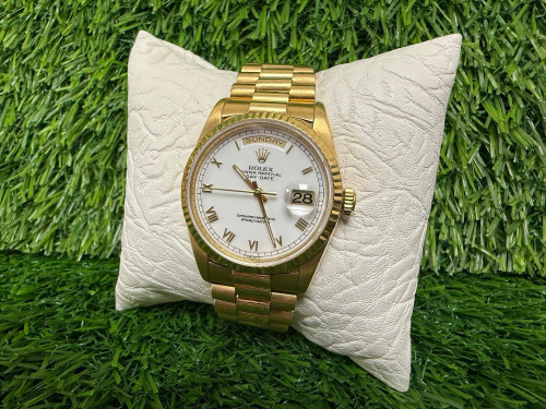 Rolex Day-Date President 18ct Gold Wrist Watch, 36mm Gold & White Dial, Model 18238, Year 1995. Bracelet is Advised to be Aftermarket. NOTE: no original box or papers available with this watch and we have had verified as original Rolex, other than afte