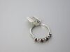 9ct White Gold Ring with 4 Ruby's (0.40) & 3 Diamonds (0.23). Size M-N. RRP &pound;1125. - 3