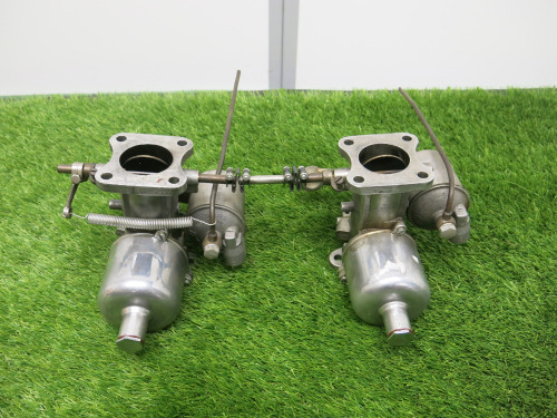 Pair of Linked Twin H12 SU Carburettors.