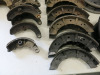 Crate Containing 16 x Pairs of Brake Shoes (As Viewed), 17 x Brake Drum Back Plates. NOTE: all appear to be for Jaguar models. - 5
