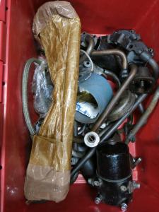 Crate Containing Quantity of Various Jaguar Oil Pick Pipes, Oil Filter Housings & Oil Pumps.