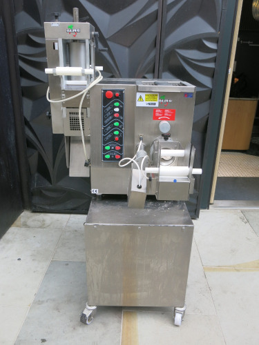Italgi Extruder Based Combination Pasta Machine, Model Combimax, S/N 286, DOM 07-2023. Comes with Mobile Stainless Steel Cupboard. Comes with GS12PE, S/NF2212272. Size H170 x W100 x D58cm.