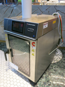 Convotherm Combi Steamer, Type OES 10.10 Mini, S/N XSPTES429. Comes with Brita Purity C500 Steam Water Filter. Size H90 x W52 x D78cm. NOTE: back panel requires screws to affix to body.