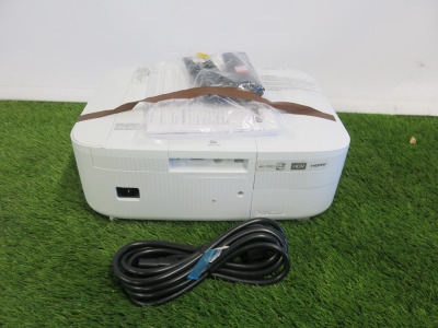 Epson LCD 4K Projector, Model EH-TW6250, S/N XBSX2X00576. Comes with Power Supply, Manuals & Remote Controls.