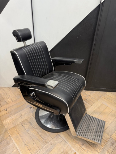 REM Voyager Black Barbers Chair with White Piping, Adjustable Height & Head Rest, S/N 010608. NOTE; Requires bolt in footrest.