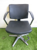 Professional Height Adjustable Barbers Chair on Chrome Base in Black PVC.