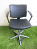 Professional Height Adjustable Barbers Chair on Chrome Base in Black PVC.