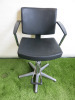 Professional Height Adjustable Barbers Chair on Chrome Base in Black PVC.
